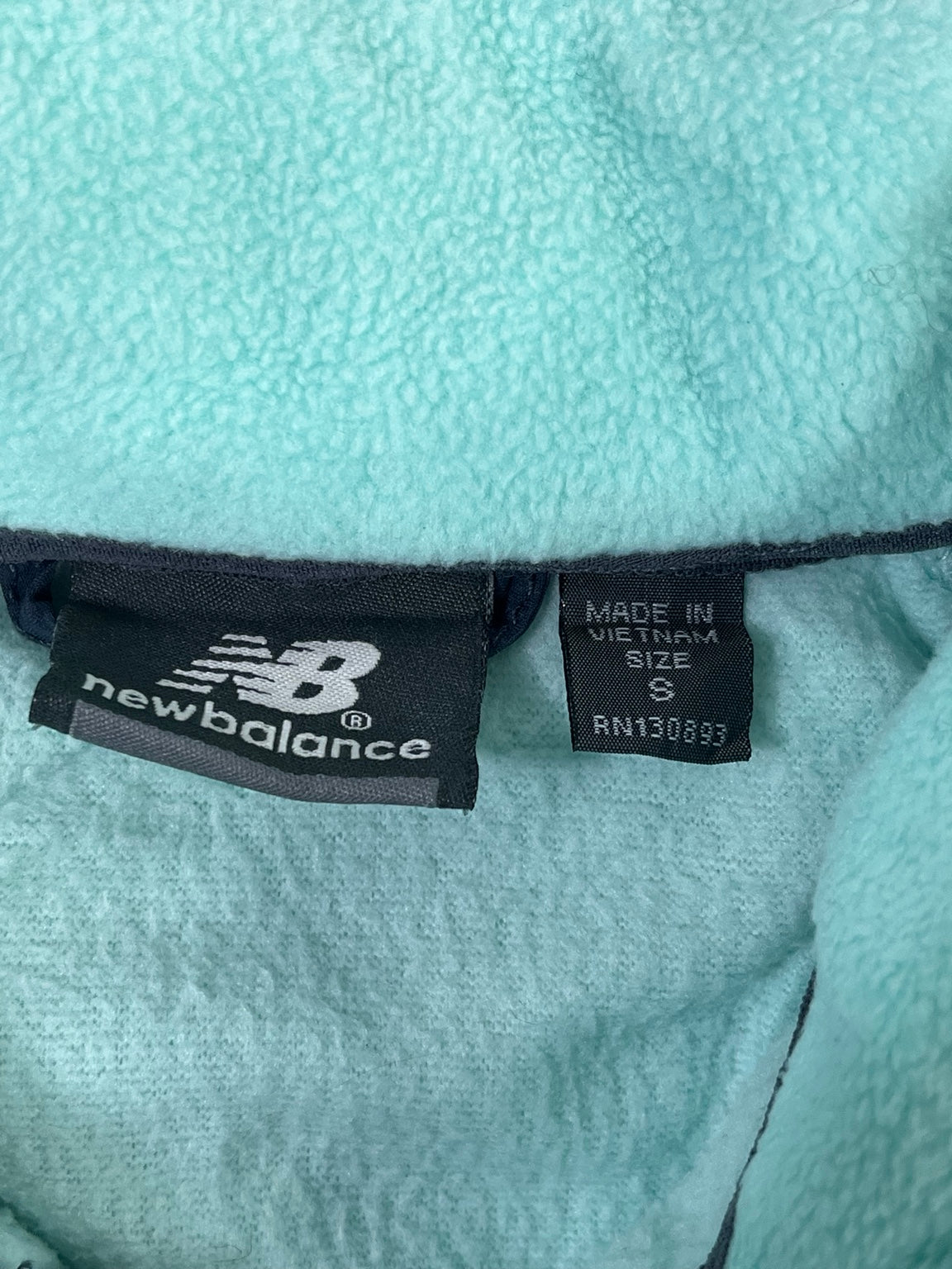 Fotografía original etiqueta New Balance talla S