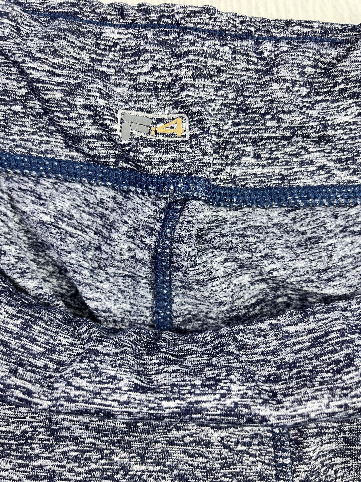 CALZA DEPORTIVA FILA MUJER PIERNA ANCHA AZUL JASPEADO
