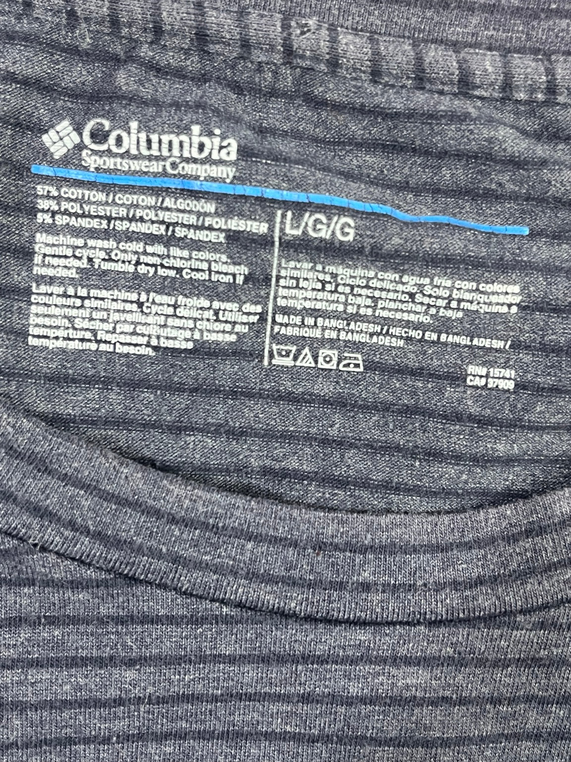 Fotografía original etiqueta Columbia L y composición 57% algodón 38% poliéster 5% elastano