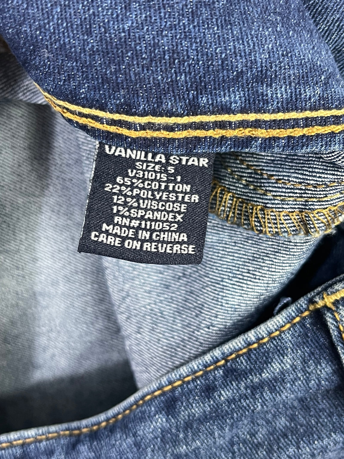 Etiqueta de talla 5 y composición short Vanilla Star