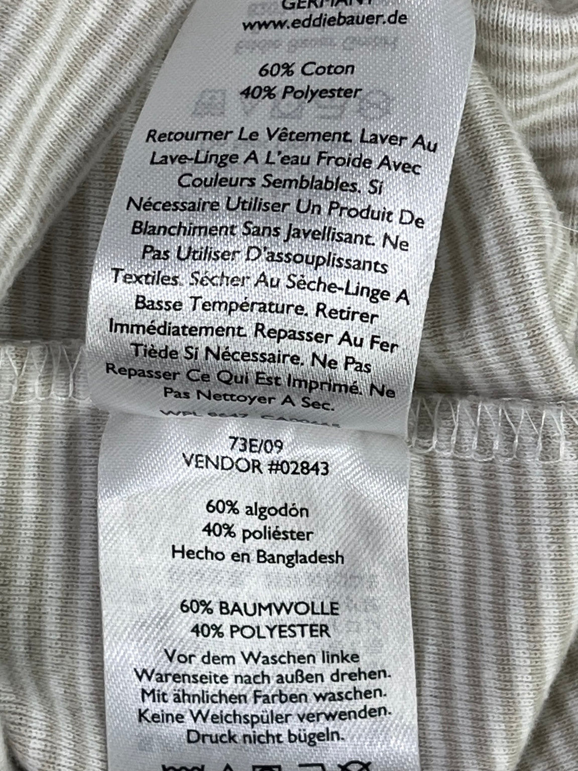 Etiqueta real de composición Eddie Bauer en español