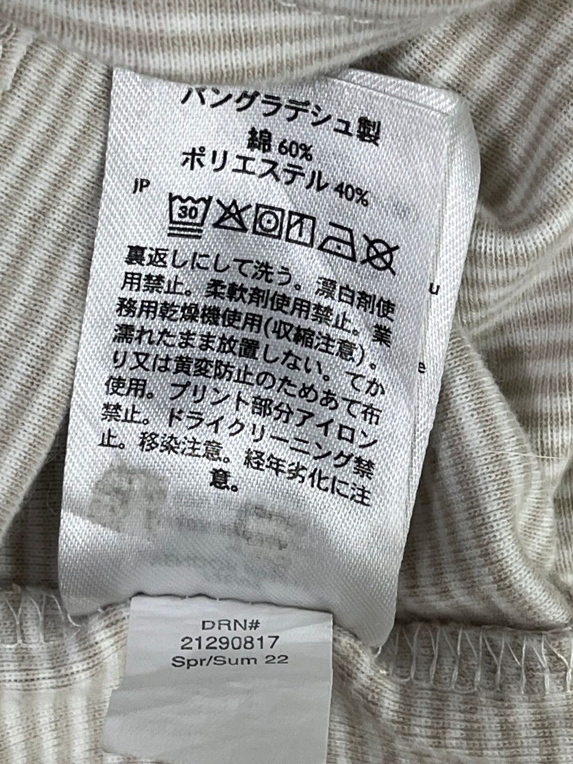Etiqueta de instrucciones original polera Eddie Bauer