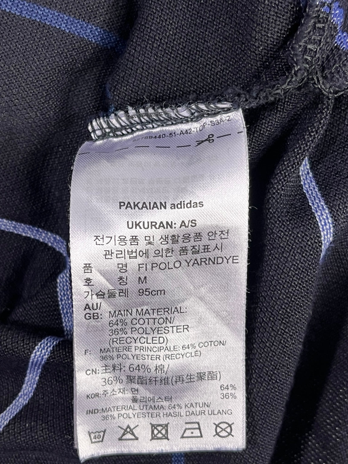 Prenda real: composición 64% algodón 36% poliéster reciclado