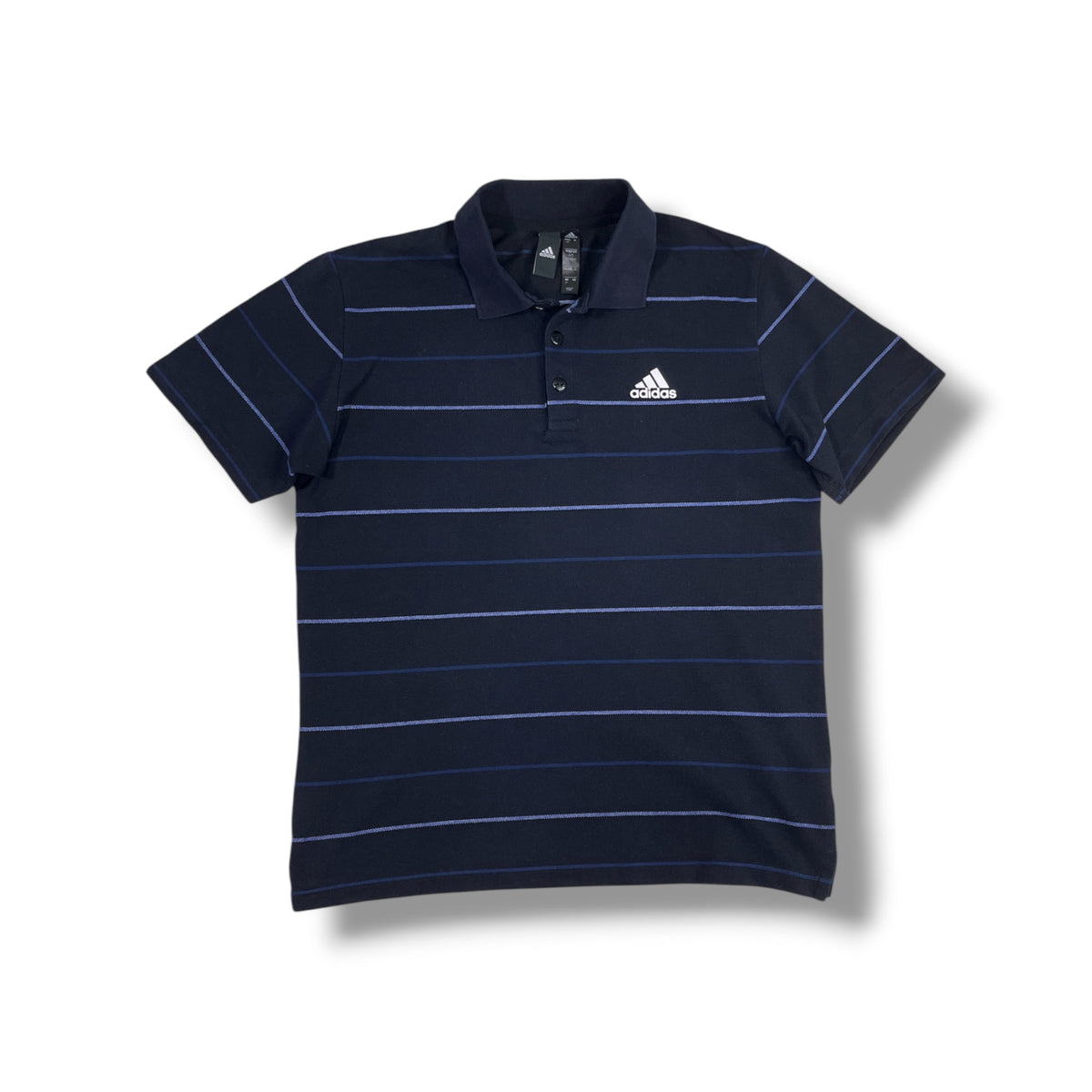 Prenda real: vista frontal polo Adidas azul marino a rayas