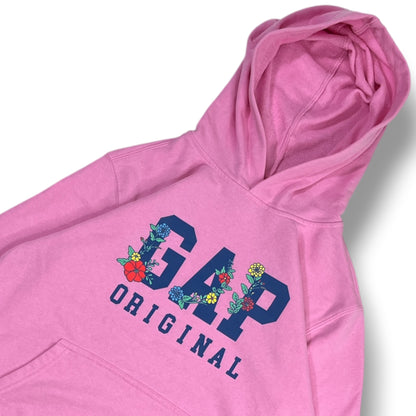 Foto real detalle GAP Original con flores