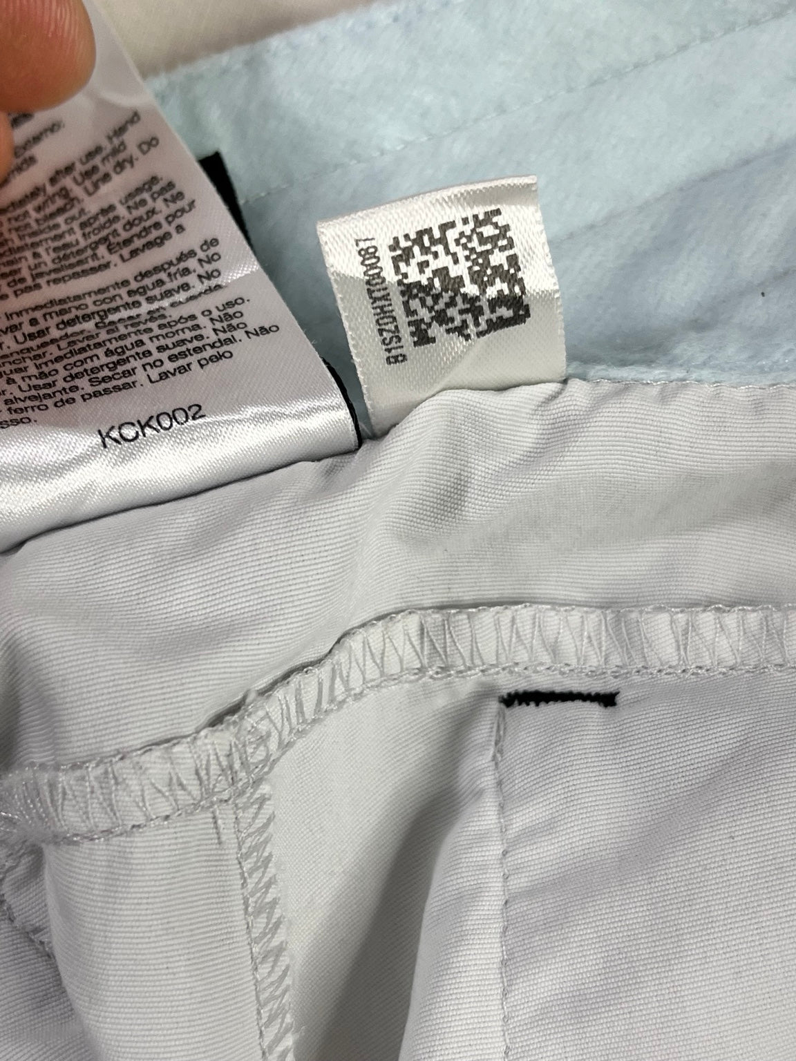 Etiqueta interior original de código de fabricación Adidas