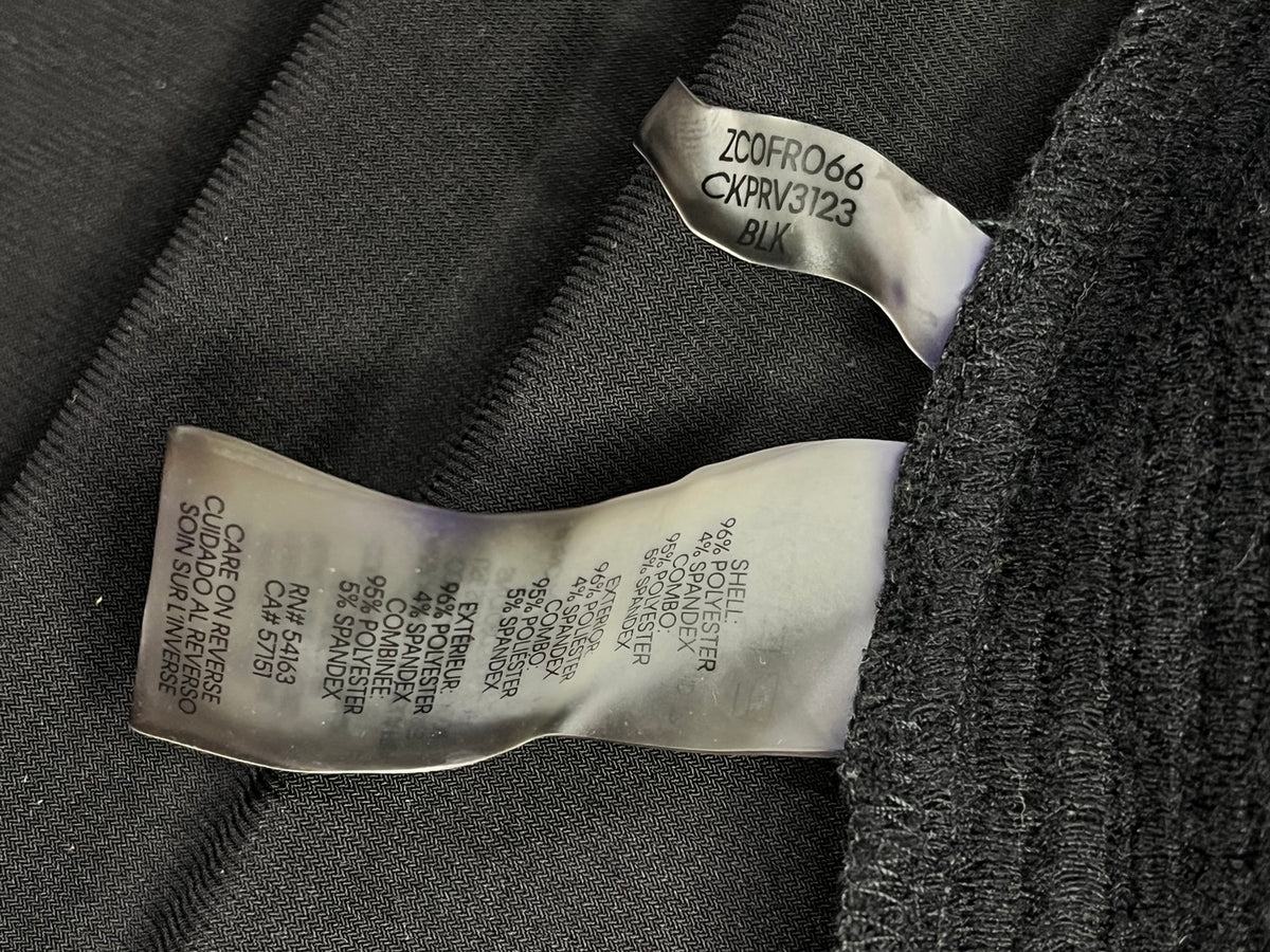 Etiqueta real composición cárdigan Calvin Klein 96% poliéster 4% spandex, combinación 95% poliéster 5% spandex