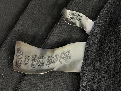 Etiqueta real composición cárdigan Calvin Klein 96% poliéster 4% spandex, combinación 95% poliéster 5% spandex