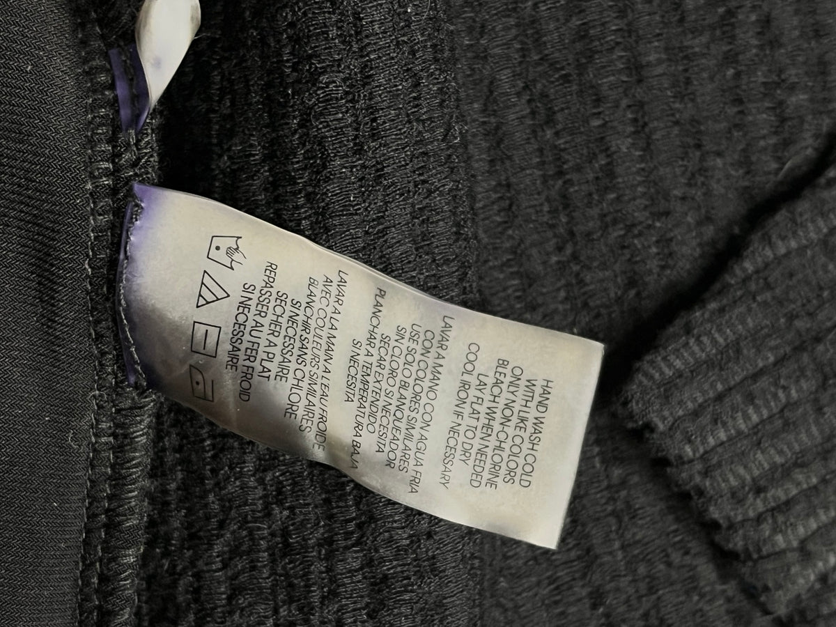 Etiqueta real instrucciones de cuidado cárdigan Calvin Klein
