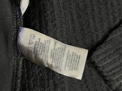 Etiqueta real instrucciones de cuidado cárdigan Calvin Klein