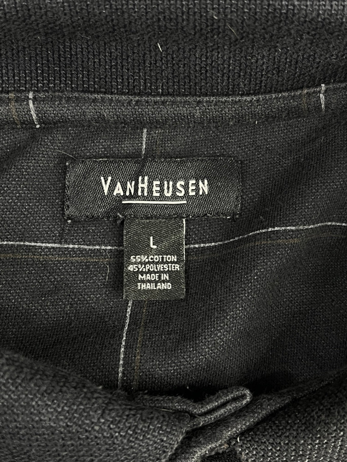 Etiqueta marca Van Heusen, talla L, composición