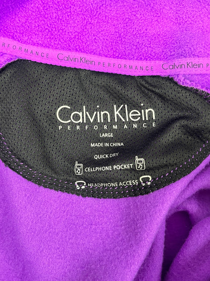 Etiqueta talla L Calvin Klein Performance con propiedades
