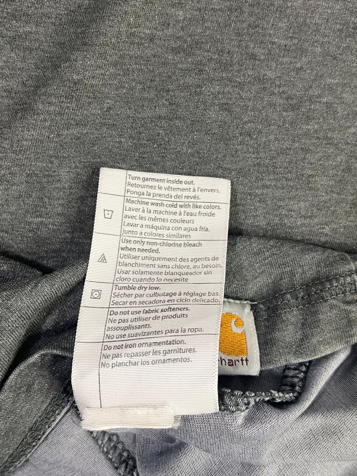 Etiqueta original de cuidados de lavado