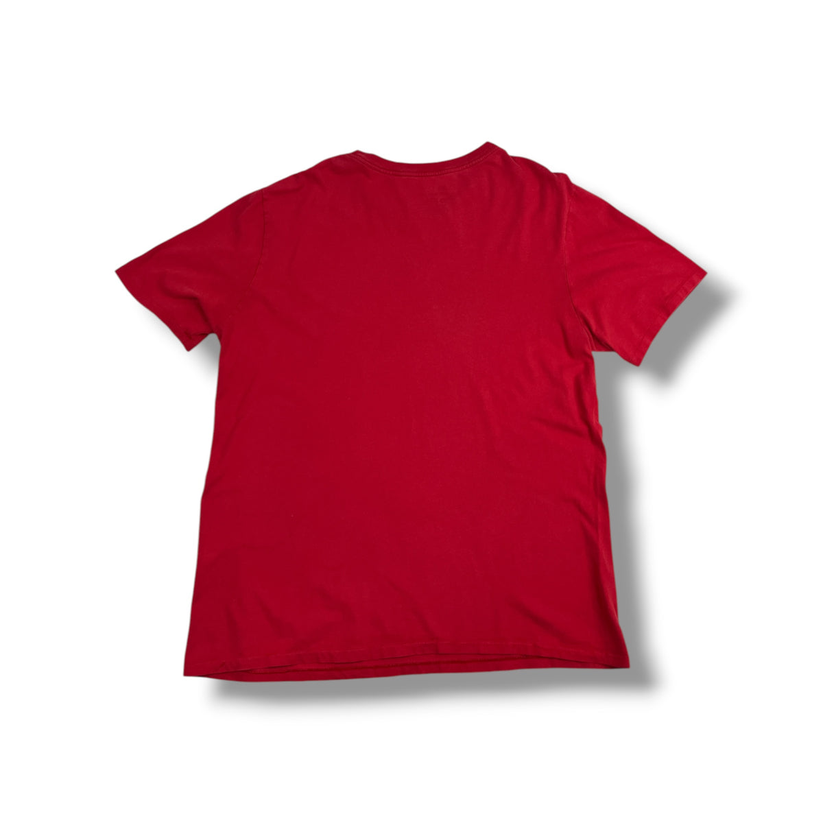 Foto original posterior de polera Nike roja