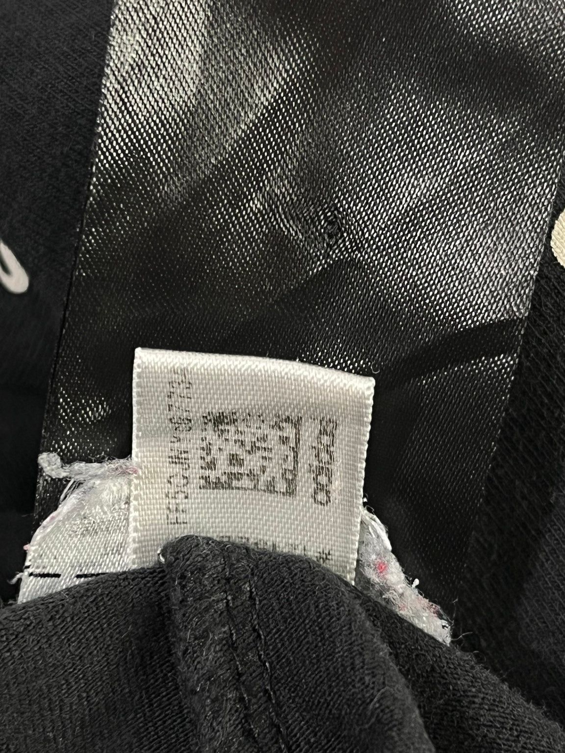 Etiqueta secundaria original de la calza Adidas