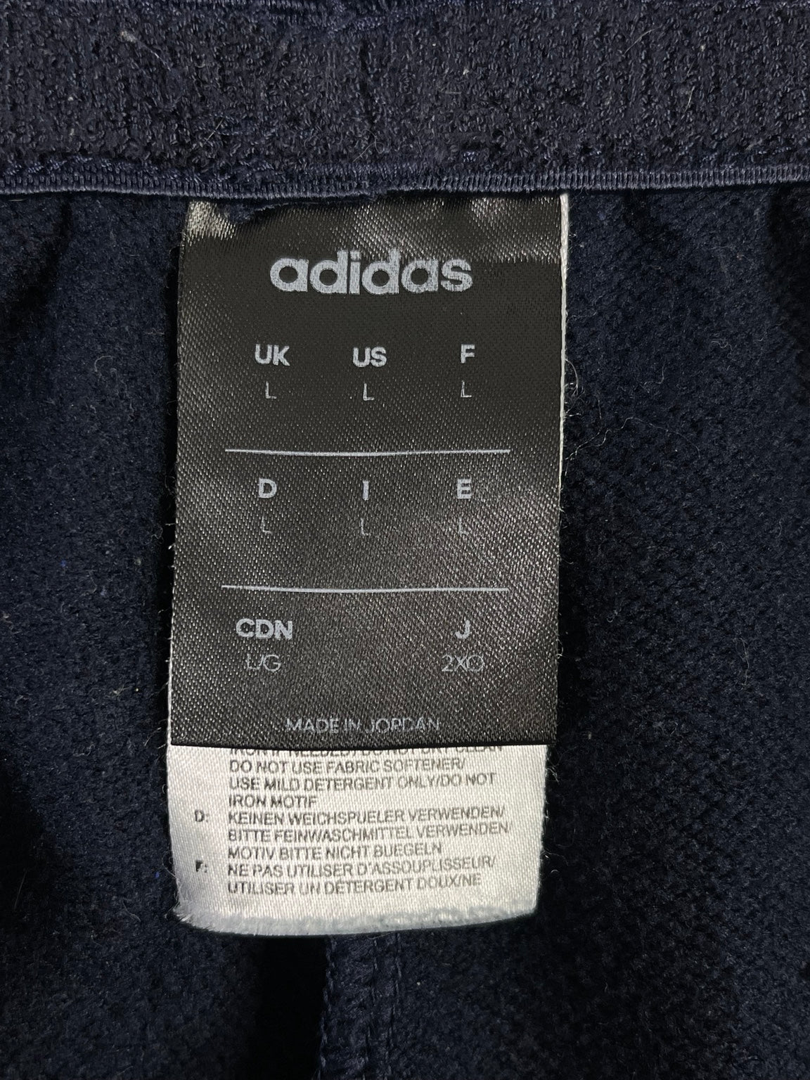 Etiqueta Adidas talla L