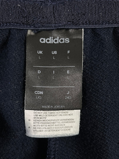 Etiqueta Adidas talla L