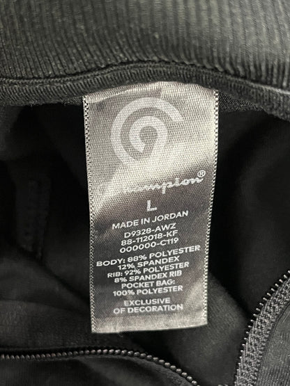 Etiqueta de talla L y composición de C9 Champion