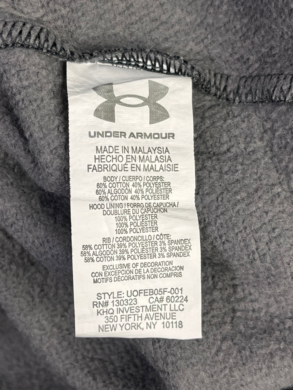 Etiqueta original Under Armour: talla YLG, composición y fabricación