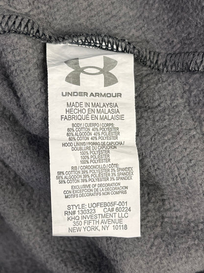 Etiqueta original Under Armour: talla YLG, composición y fabricación