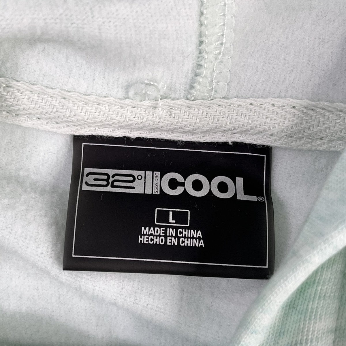 Etiqueta real 32 Degrees Cool talla L, encuadre cuadrado ampliado
