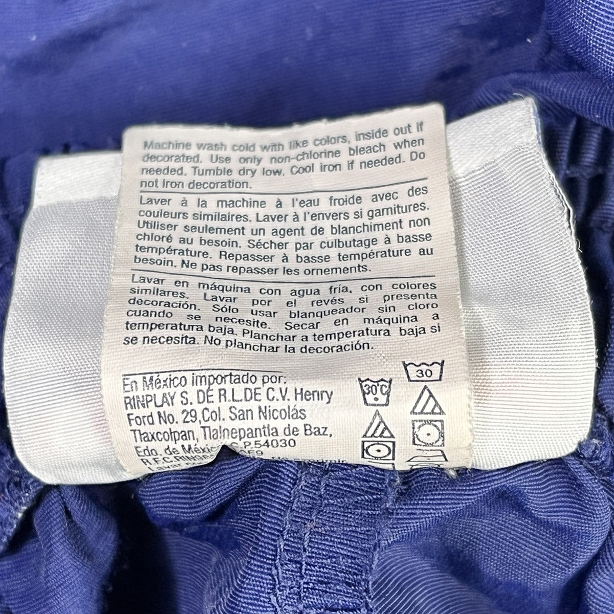 Etiqueta Champion instrucciones de lavado