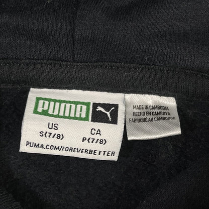 Etiqueta real Puma talla S infantil, ampliada 1:1