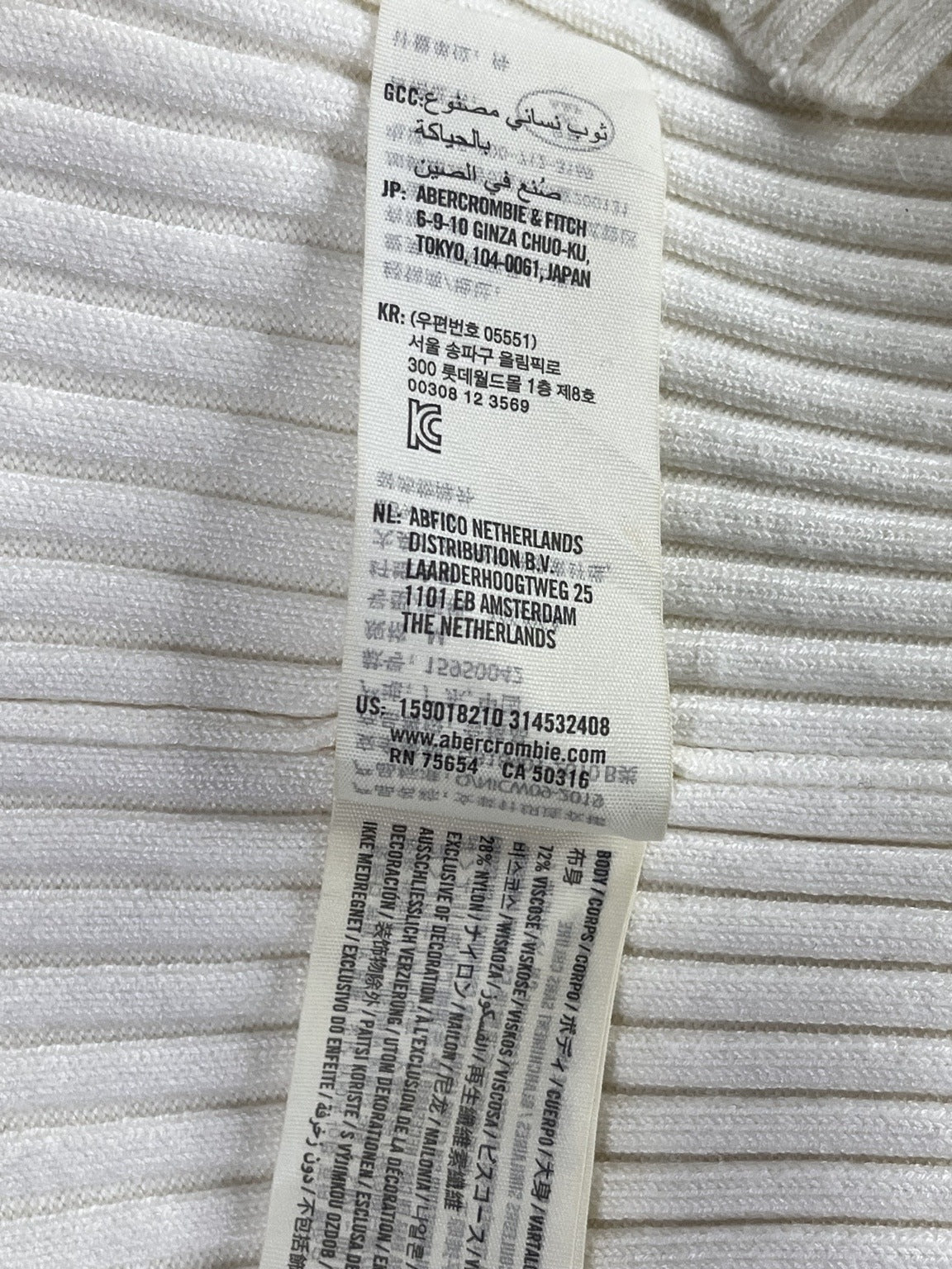 Composición y etiquetas de fabricación del vestido