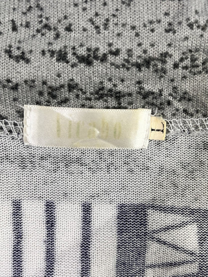 Etiqueta real de talla y marca