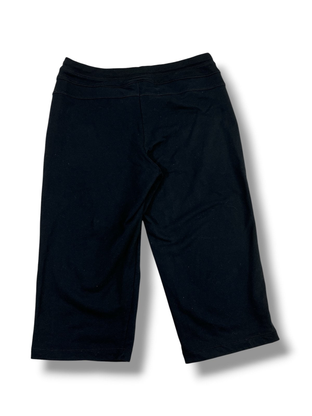 Fotografía real de pantalón capri negro The North Face, vista trasera