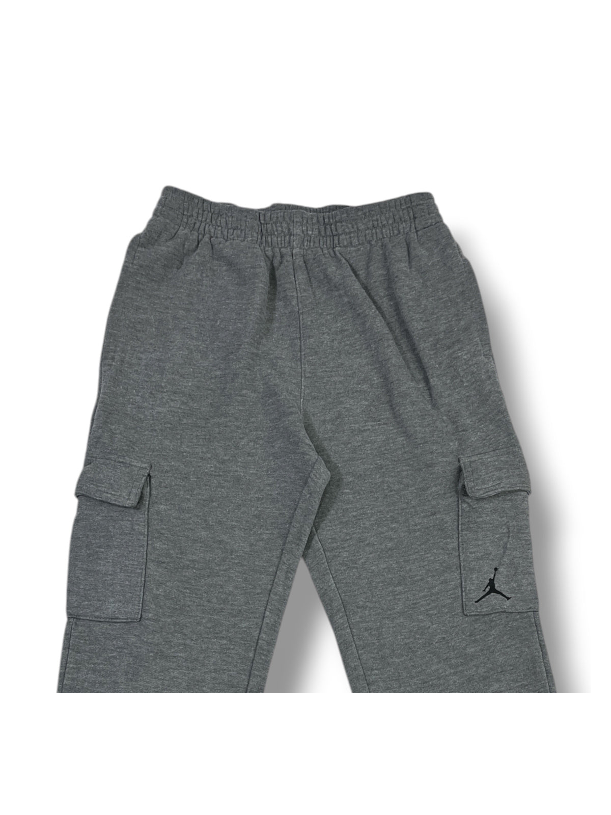 Fotografía real de cintura elástica y bolsillos cargo con logo Jumpman