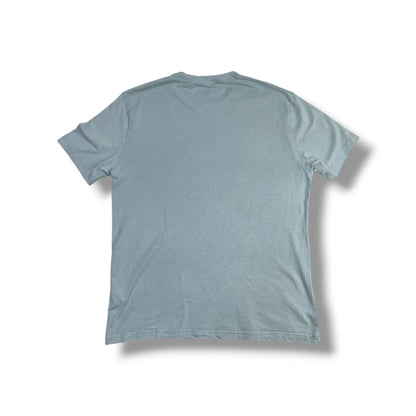 Vista trasera polera Hurley celeste