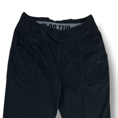 Detalle cintura y bolsillos Nike Obsessed negro M