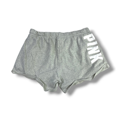 Fotografía real posterior del short PINK gris jaspeado con logo blanco