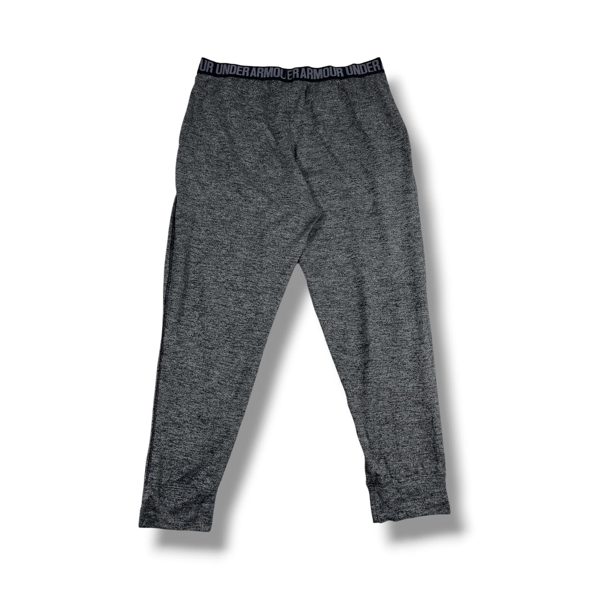 PANTALÓN DEPORTIVO UNDER ARMOUR HOMBRE GRIS JASPEADO TALLA M APROX.