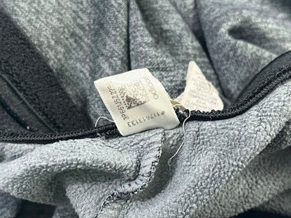 Pantalón de buzo Adidas gris jaspeado Talla L