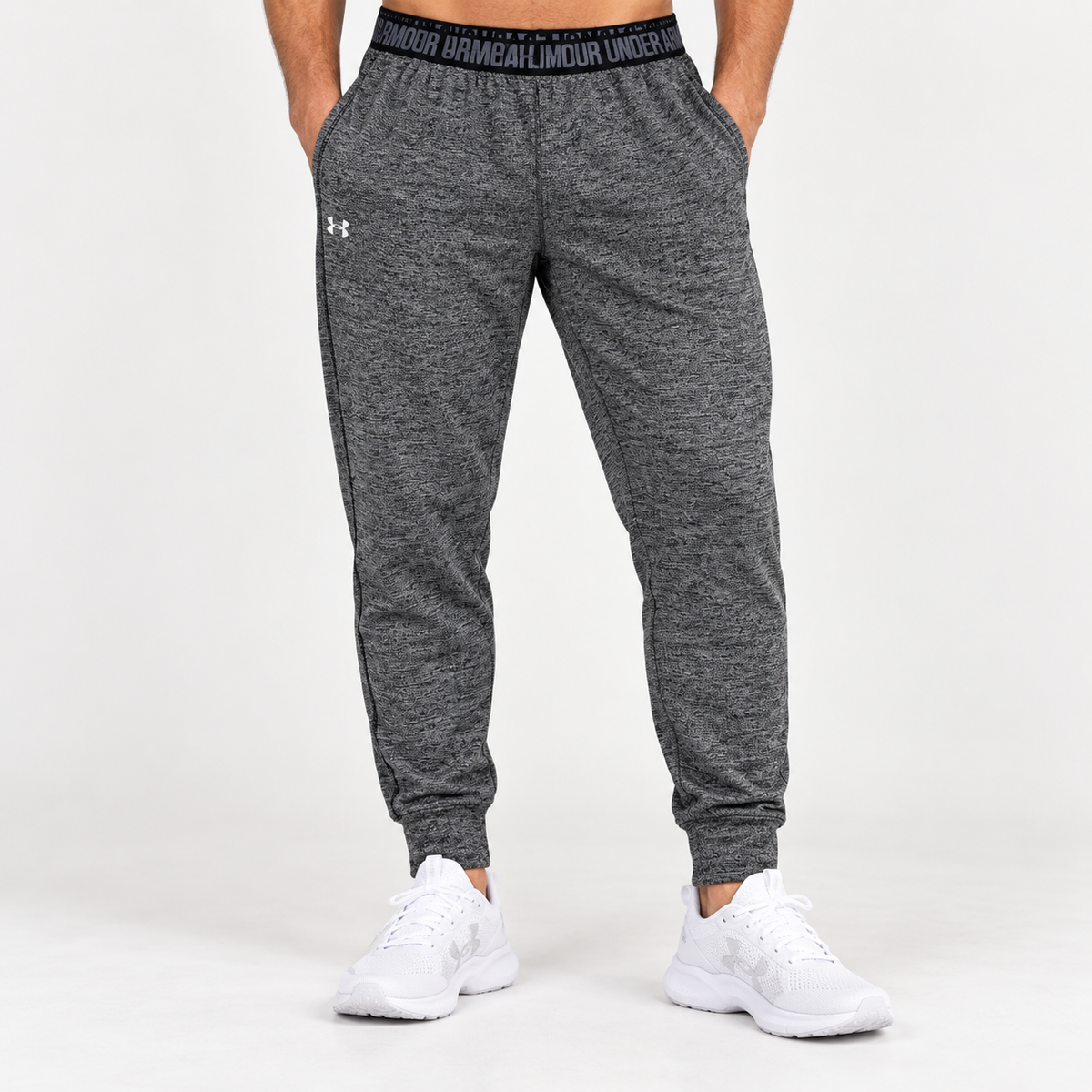PANTALÓN DEPORTIVO UNDER ARMOUR HOMBRE GRIS JASPEADO TALLA M APROX.