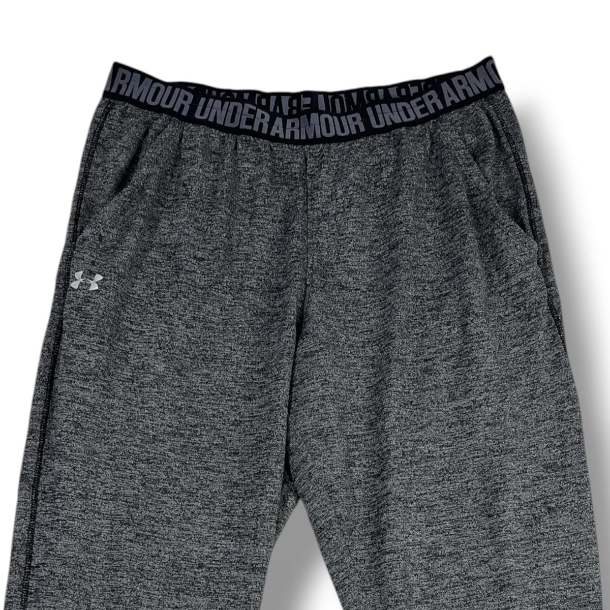 PANTALÓN DEPORTIVO UNDER ARMOUR HOMBRE GRIS JASPEADO TALLA M APROX.
