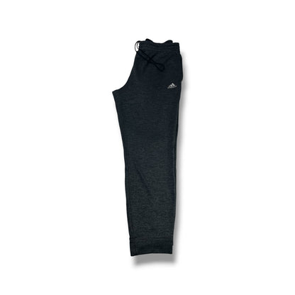 Pantalón de buzo Adidas gris jaspeado Talla L