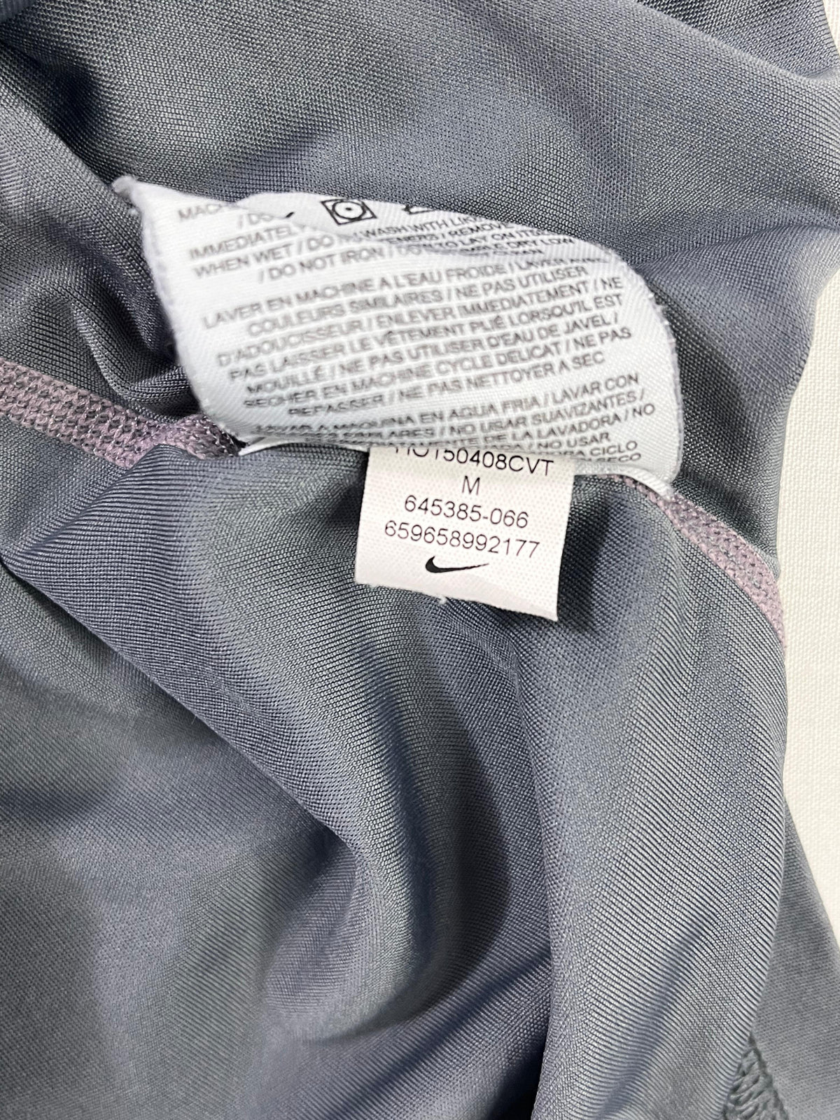 POLERA DEPORTIVA HOMBRE NIKE DRI-FIT MANGA LARGA TALLA M GRIS