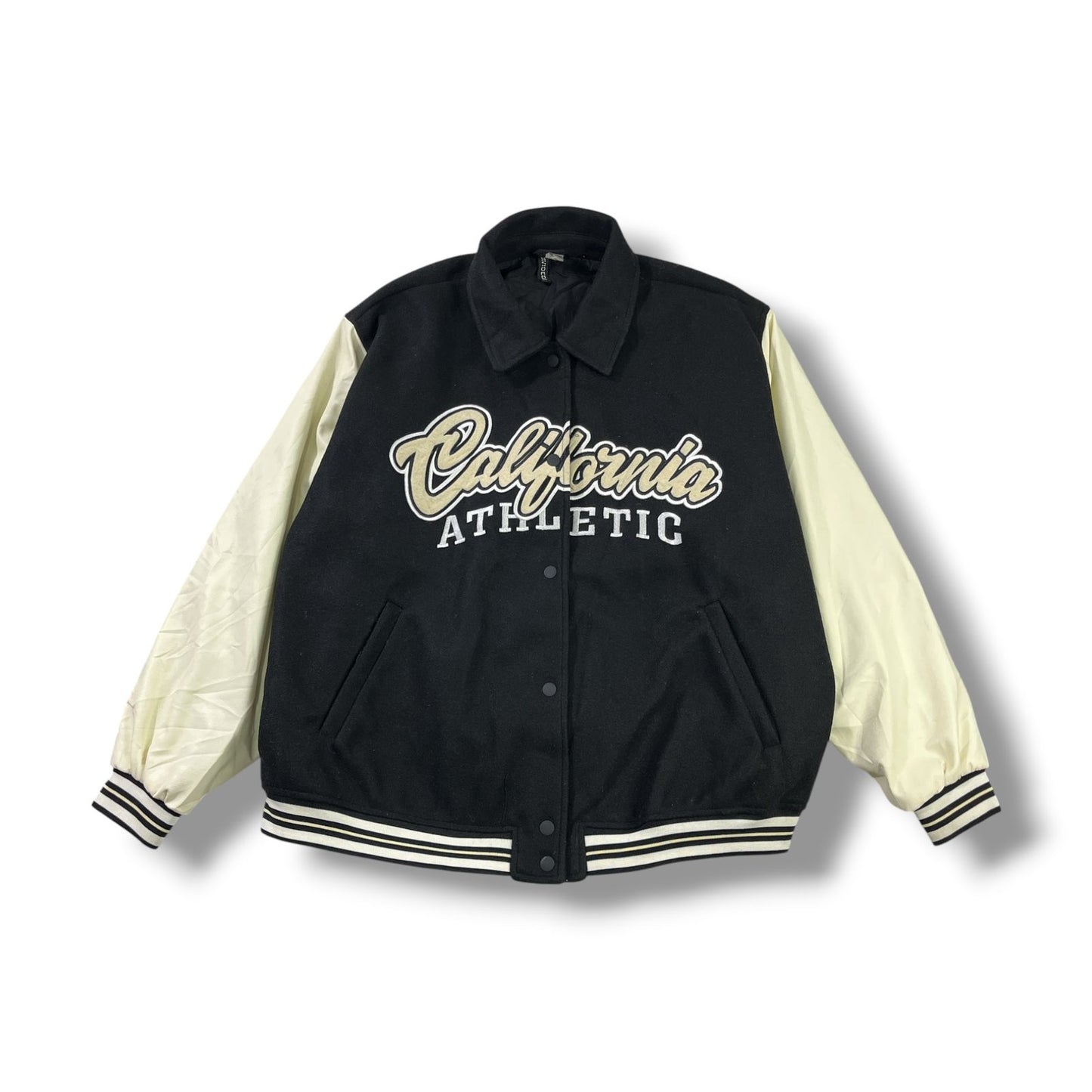 CHAQUETA BOMBER H&M DIVIDED CALIFORNIA ATHLETIC TALLA XL NEGRA/CREMA
