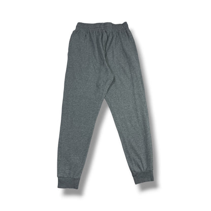 Fotografía real posterior pantalón Under Armour gris jaspeado