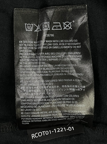 Etiqueta de cuidados original de la polera Volcom